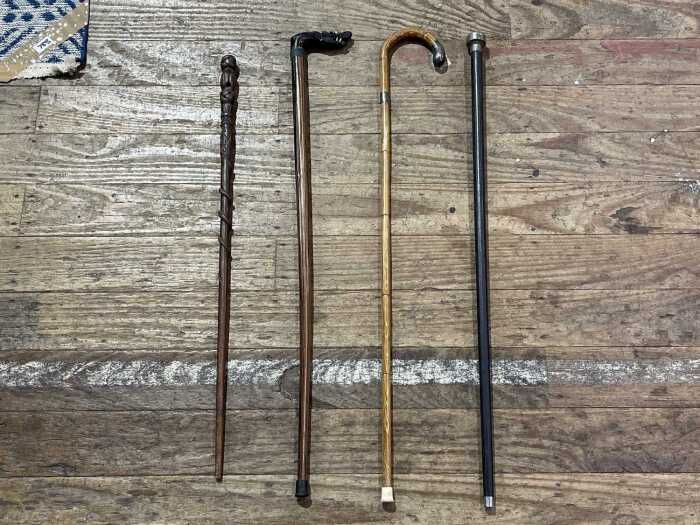 Four antique timber walking sticks