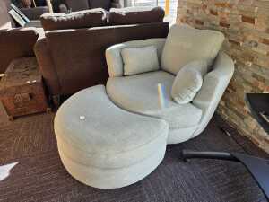 Plush 'Snuggle Petite' swivel lounge chair with ottoman
