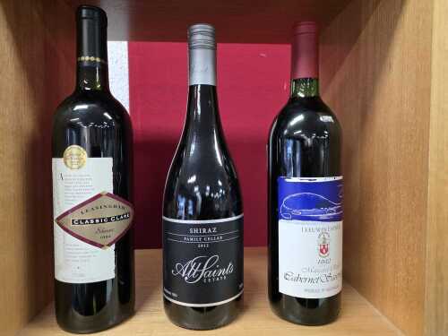 42 · Mixed red wine, three bottles