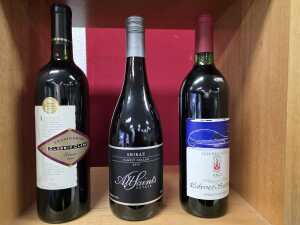 Mixed red wine, three bottles