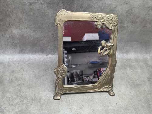 63 · Art Nouveau style brass framed mirror