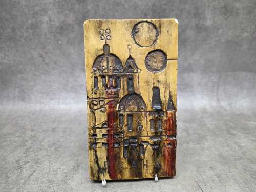 78 · Mid-century ceramic wall plaque featuring a stylised cityscape of Prague