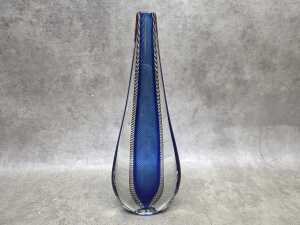Vase with submerged blue glass and ribbon design