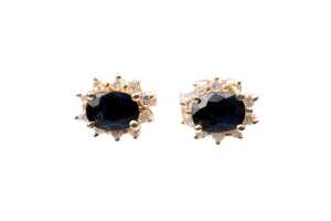 A pair of sapphire and diamond earrings in 14ct yellow gold with 9ct backings.
