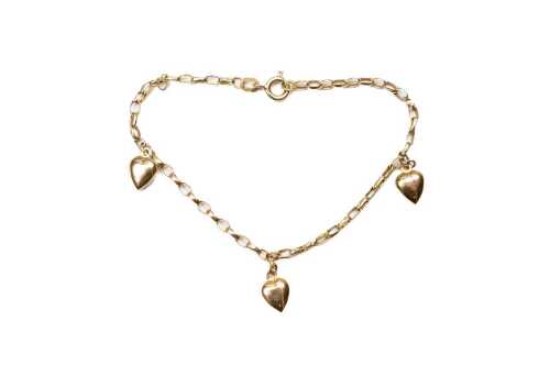 A oval belcher link bracelet in 9 carat yellow gold