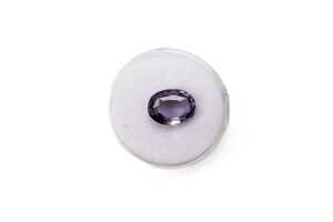 A natural oval sapphire weighing 3.40ct. - 4