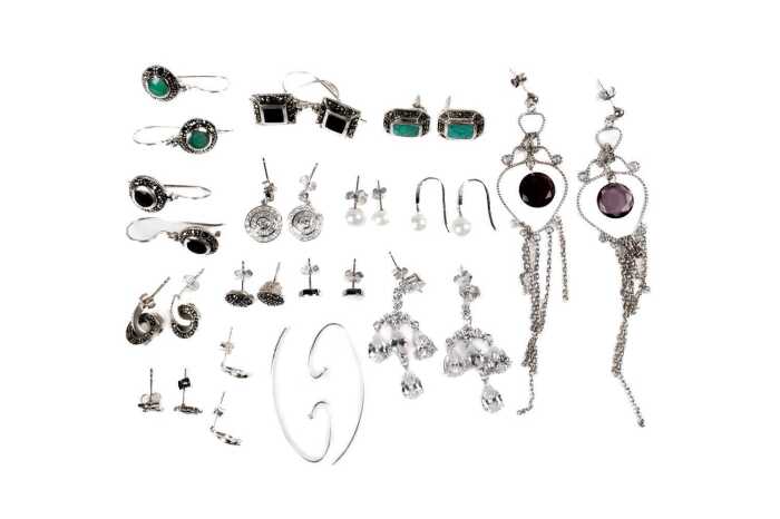 A collection of earrings in sterling silver
