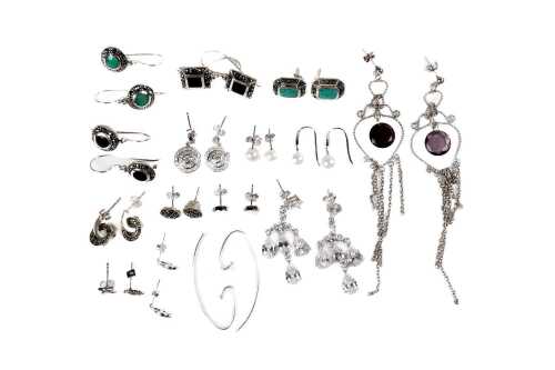 A collection of earrings in sterling silver
