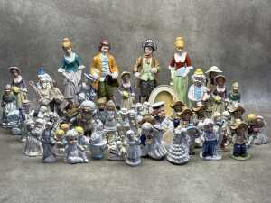 Assorted figures, mainly ceramic