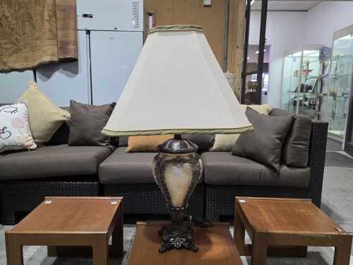 Classical-style ceramic table lamp with metal base and palmette and feather decoration.