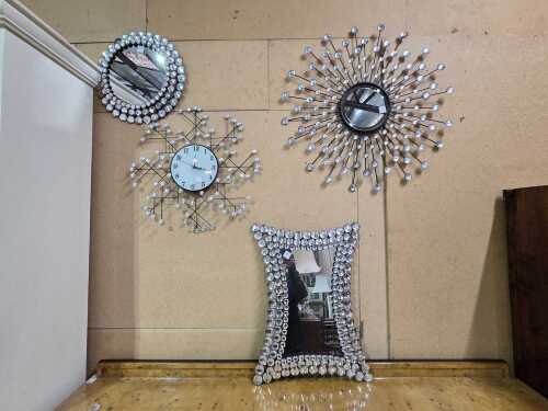 Three wall mirrors with decorative design