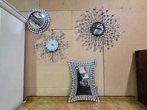 Three wall mirrors with decorative design