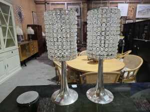 Pair of silver-tone and glass decorated candle stands