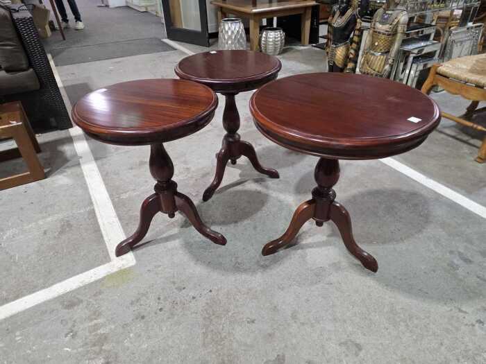 Three pedestal occasional tables