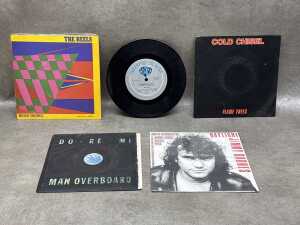 Five Australian 7" singles