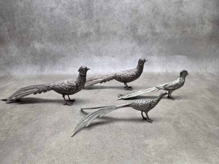 Two pairs of cast metal pheasant figures