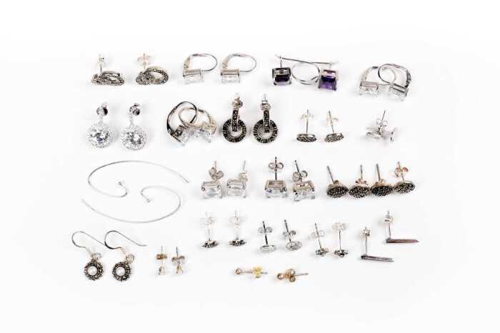 A collection of earrings in sterling silver