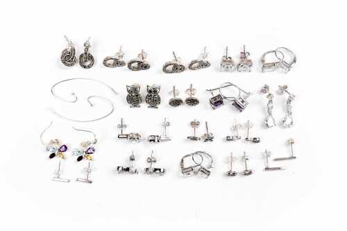 A collection of earrings in sterling silver