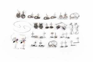 A collection of earrings in sterling silver