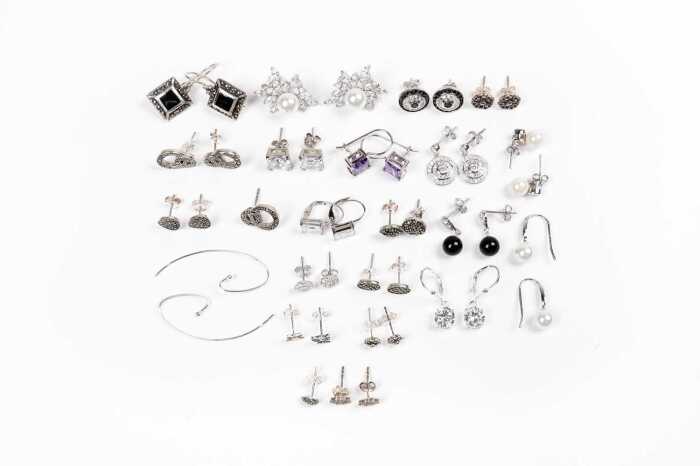 A collection of earrings in sterling silver