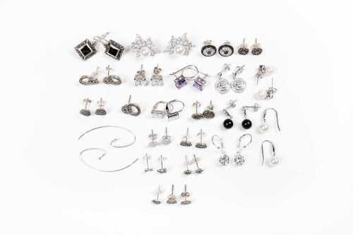 A collection of earrings in sterling silver