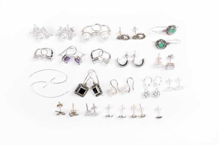 A collection of earrings in sterling silver