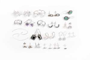 A collection of earrings in sterling silver