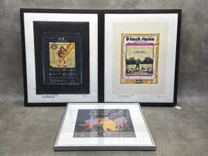 Three framed rock music prints