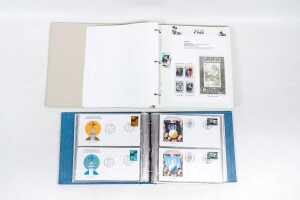 Two stamp albums, including United Nations F.D.C album