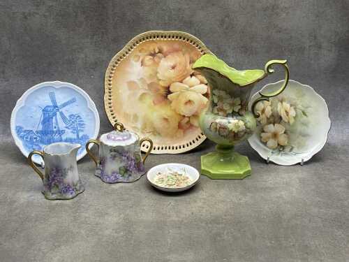 Hand-painted porcelain, including plates, ewer