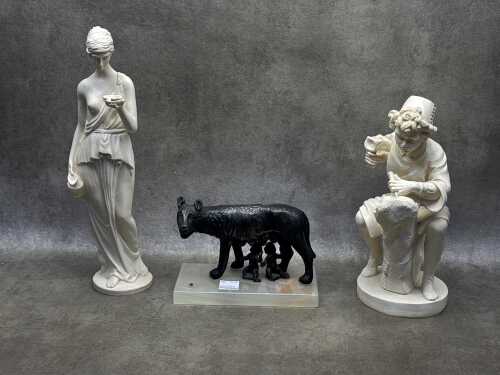 Three Classical reproduction figures including metal and onyx Romulus and Remus and 2x resin figures