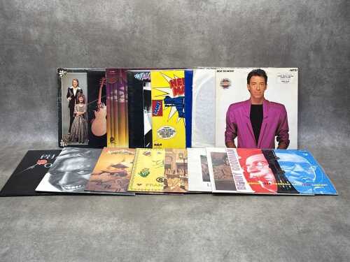 Assorted vinyl records, including ABBA, Elton John