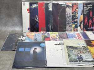 25 vinyl records, mostly Rock and Pop, including Status Quo, Graham Parker - 2