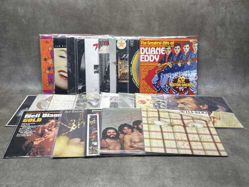 25 vinyl records, mostly Rock and Pop, including Roxy Music, Kim Carnes