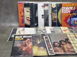 25 vinyl records, mostly Rock and Pop, including Roxy Music, Kim Carnes - 2