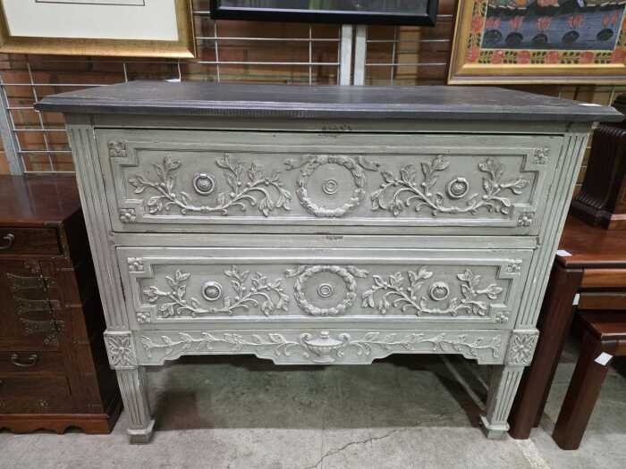 Grey carved two-drawer chest