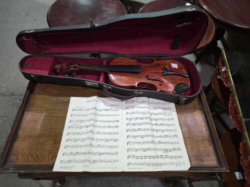 Violin in hard case with bow