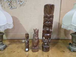 Three timber Oceanic carved figures