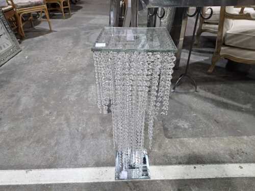Glass side table with tiered crystal pendants