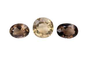 A collection of smoky quartz, blue topaz and amethyst - 2