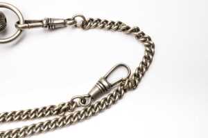 An antique watch and chain in silver tone metal - 3