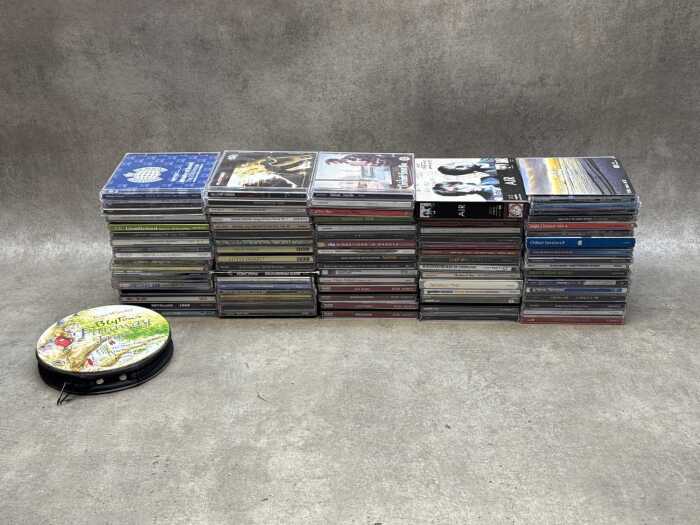 CDs, including Radiohead, Nirvana, Metallica