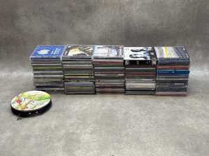 CDs, including Radiohead, Nirvana, Metallica