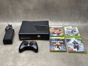 XBOX 360 slim black console and four games