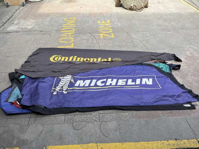 Nine nylon advertising feather banners for tyres