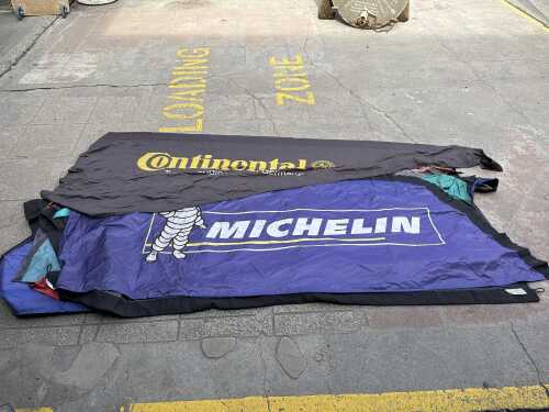 Nine nylon advertising feather banners for tyres