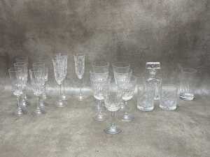 Assorted crystal drinkware, together with a decanter