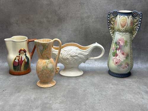 Four decorative ceramic pieces, including Beswick
