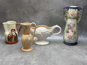 Four decorative ceramic pieces, including Beswick