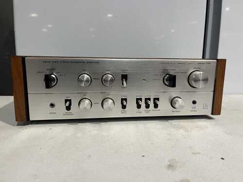 Luxman 700X solid state stereo integrated amplifier, timber cheeks, c1970